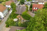 Drohnenansicht - Hastenbeck I Sanierungsbedürftiges Einfamilienhaus mit großem Grundstück in ruhiger Lage!