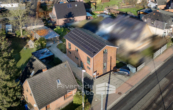 Drohnenansicht - Modern & energieeffizient: Einfamilienhaus mit Smart-Home, großer Garage, Wallbox und vielem mehr