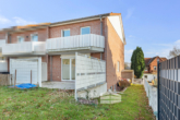 Gartenansicht - Bad Münder | Energieeffizientes Reihenendhaus mit Balkon, Terrasse und Garage – ideal für Familien