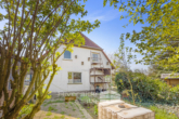 Gartenansicht - Rehburg-Loccum | Einfamilienhaus mit 7 Zimmern auf weitläufigem Eigentumsgrundstück in ruhiger Lage!
