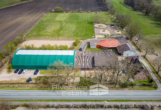 Luftaufnahme der Reitanlage - Rotenburg – Scheeßel I Top ausgestattete Reitanlage mit Reithalle – ein Zuhause für Pferd und Mensch