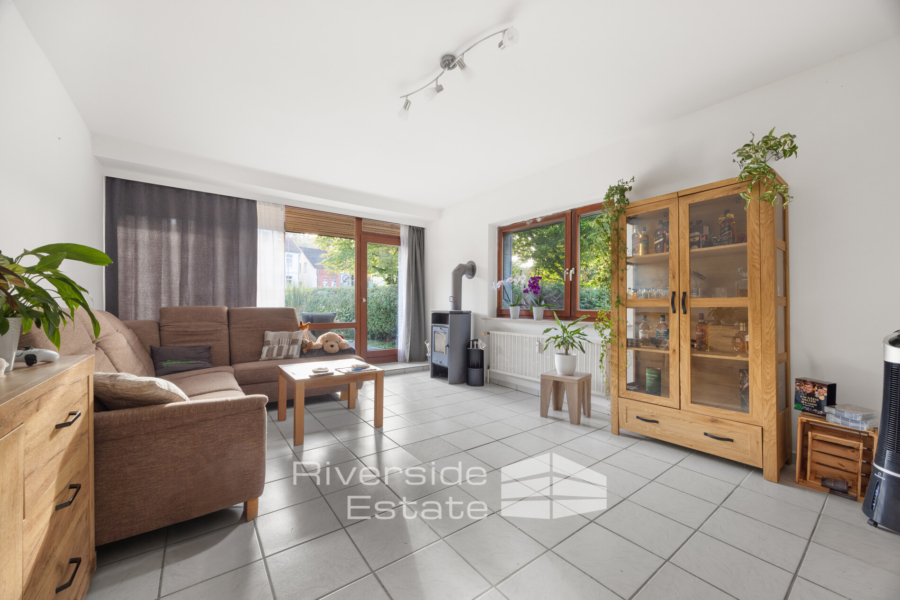 Wohnzimmer mit Zugang zur Terrasse