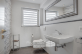 WC im Erdgeschoss - Modernisiertes Einfamilienhaus mit Pool & Wintergarten in ruhiger Lage von Benstorf