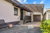 Carport & Garage - Einfamilienhaus in ruhiger Lage mit Potenzial – Erbpachtgrundstück mit Möglichkeit zum Kauf!