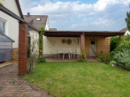 Garten und überdachte Sitzfläche