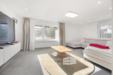 Wohnzimmer - Attraktive Doppelhaushälfte am Klüt mit Wintergarten, Garage & Eigentumsgrundstück!