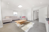 Wohnzimmer - Attraktive Doppelhaushälfte am Klüt mit Wintergarten, Garage & Eigentumsgrundstück!
