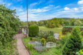 Gartenansicht - Lügde | Großzügiges Einfamilienhaus mit Ausbaupotential und Terrasse